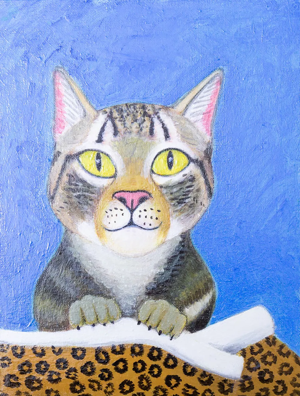 Yellow-Eyed Tabby Cat in Blue